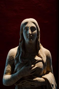 Sculpture of antiquity in the form of a statue of a woman. High quality photo