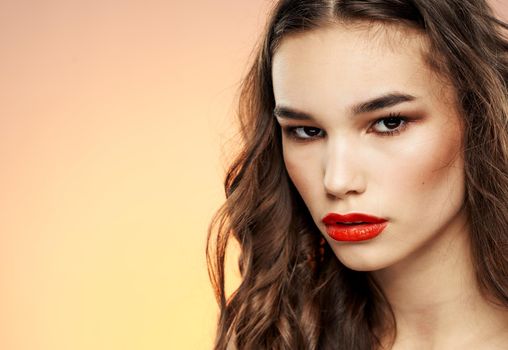 Woman portrait red lips shadows on eyelids brunette eyebrows. High quality photo