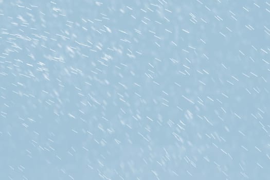 Abstract background of raindrops in light blue tonality
