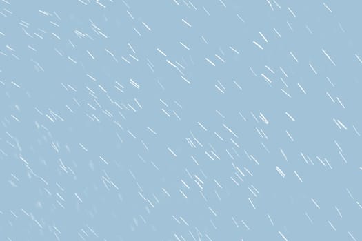 Abstract background of raindrops in light blue tonality