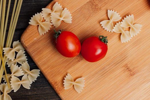 cooking italian cuisine flour product kitchen table cherry tomatoes. High quality photo