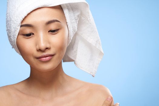 asian woman bare shoulders clear skin health rejuvenation close-up. High quality photo