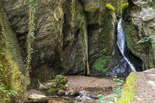 Landscape around the waterfall and the creek Tiefenbach near Bernkastel-Kues on river Moselle in autumn