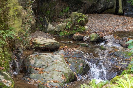 Landscape around the waterfall and the creek Tiefenbach near Bernkastel-Kues on river Moselle in autumn