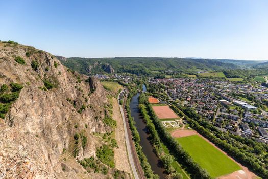 High angle view from the Rotenfels of Bad Muenster am Stein Ebernburg with rock massif and Nahe river