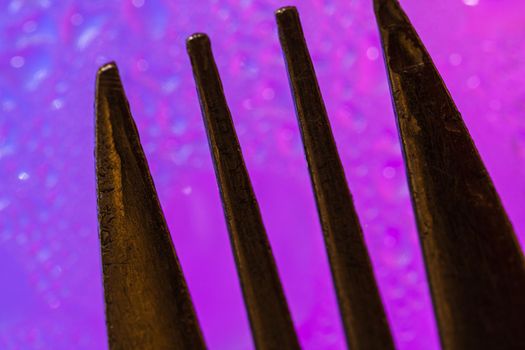 Abstract fork detail on colorful surface. Abstract background concept