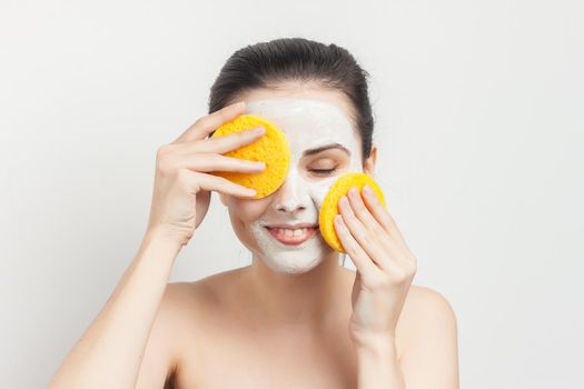 woman naked shoulders face cream skin care cosmetology close-up. High quality photo