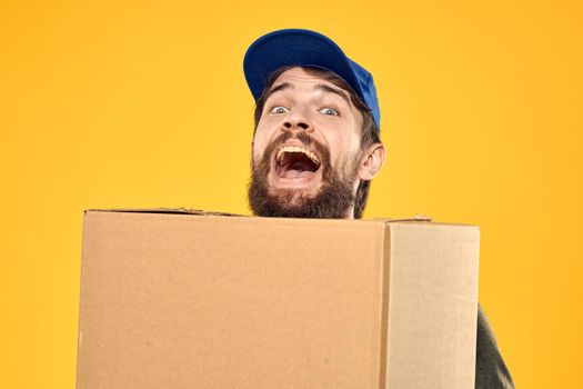 man in work uniform blue cap toolbox cheating. High quality photo