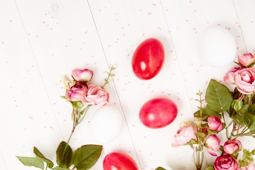 painted eggs flowers holiday decoration light background. High quality photo
