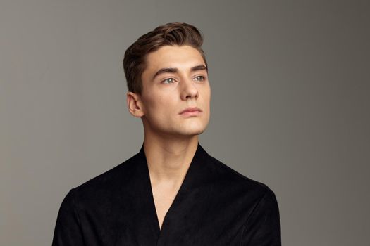 handsome man fashion hairstyle glamor attractive look close-up. High quality photo