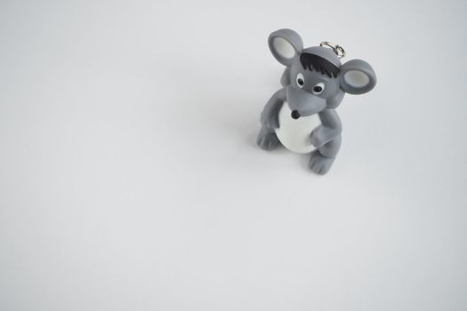 Children's toy mouse on a white background. Symbol of the year. Isolated on a white background.