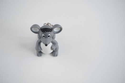 Children's toy mouse on a white background. Symbol of the year. Isolated on a white background.