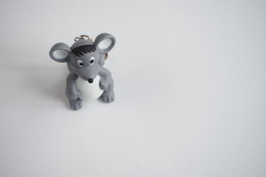 Children's toy mouse on a white background. Symbol of the year. Isolated on a white background.