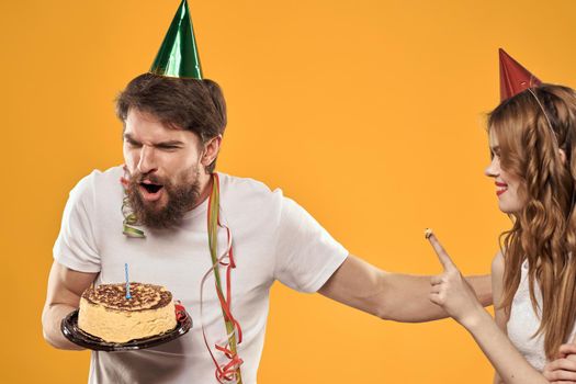 Merry time holiday cake different birthday yellow background. High quality photo