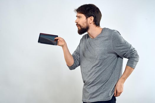 man technology wireless device communication lifestyle light background. High quality photo