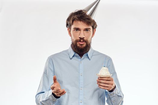 Happy guy with birthday cake white background Compact corporate party cropped beard view. High quality photo