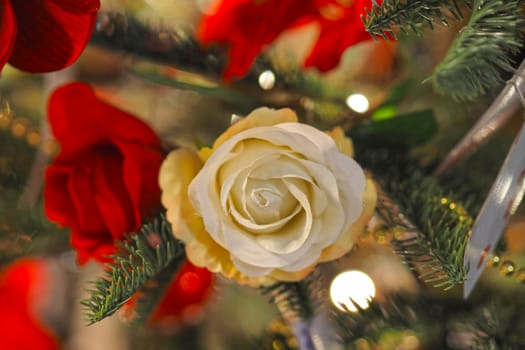 Beautiful festive background of flowers and branches of Christmas tree. High quality photo