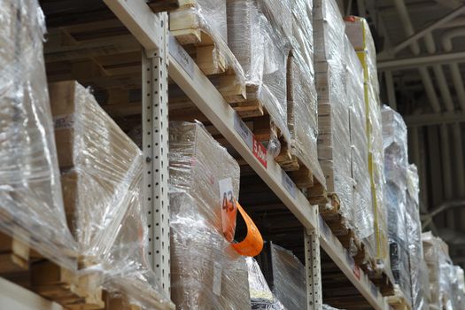 Storage of goods in warehouses. Packaged goods in warehouses of store, market or retail chains. High quality photo