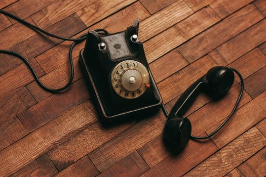 retro telephone communication technology call antique wooden background. High quality photo