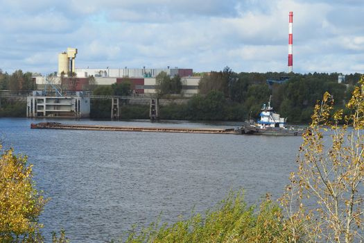 River. Seaport Production on water. Sand mining and shipping.