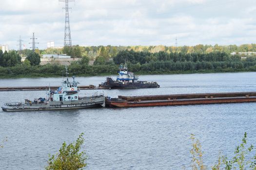 River. Seaport Production on water. Sand mining and shipping.