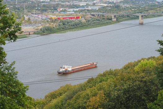 River. Seaport Production on water. Sand mining and shipping.