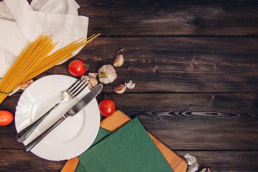 pasta italian spaghetti ingredients for cooking cherry tomatoes. High quality photo