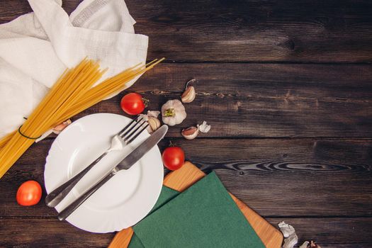 italian cuisine pasta ingredients cherry tomatoes garlic lunch. High quality photo