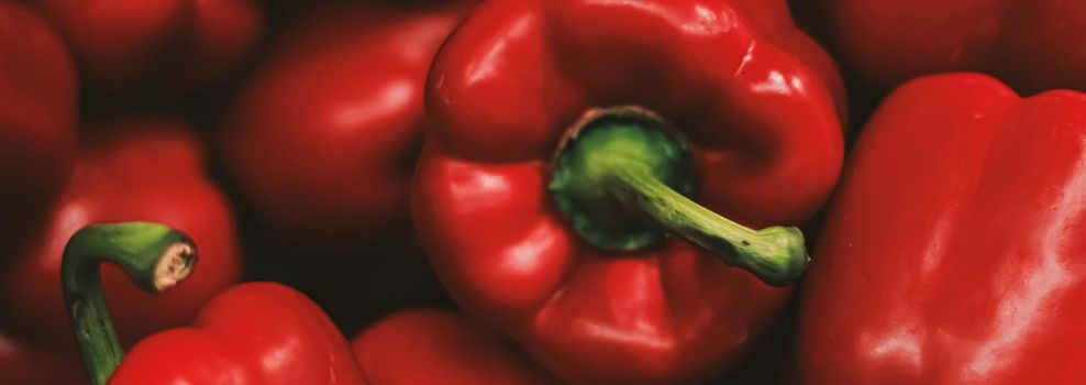Red bell peppers on farmers market, organic food and agriculture concept