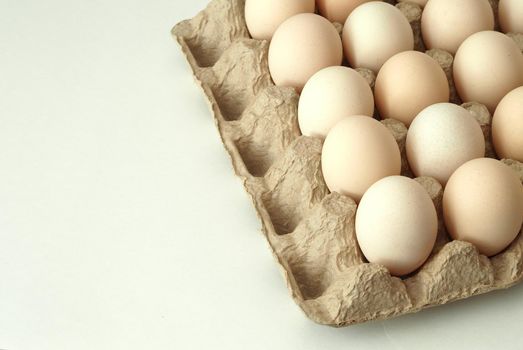 chicken eggs in a packachicken eggs in a package home village, large in an egg boxge homemade rustic. High quality photo