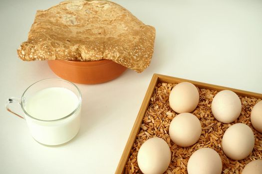 chicken eggs in a packachicken eggs in a package home village, large in an egg boxge homemade rustic. High quality photo