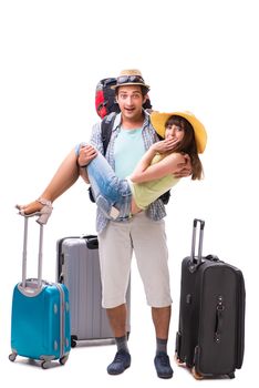 Young family preparing for vacation travel on white