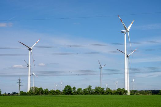 Wind turbines and power lines seen in rural Germany