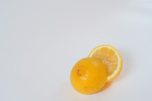 Lemon. Cut in half. Close-up, white background. High quality photo