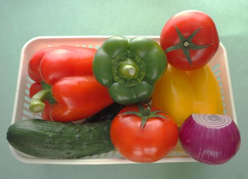 Ripe salad vegetables. Tomato cucumber salad with Bulgarian pepper.