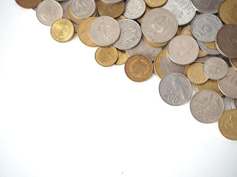 A collection of coins from different countries. Close-up