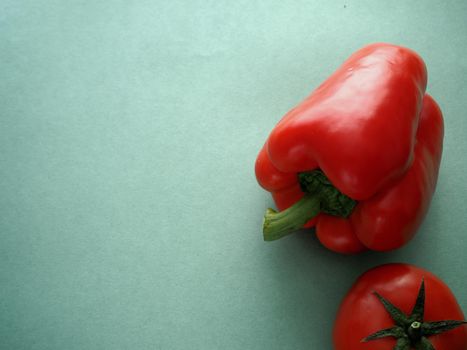 Ripe vegetables. Red bell pepper is sweet. Close-up.