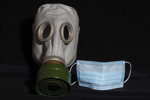 Personal protective equipment. Covid-19. A gas mask and a medical mask. High quality photo