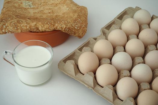 chicken eggs in a packachicken eggs in a package home village, large in an egg boxge homemade rustic. High quality photo