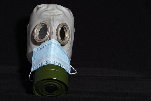 Personal protective equipment. Covid-19. A gas mask and a medical mask. High quality photo