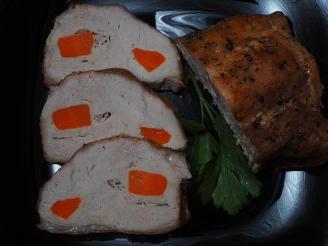 Food. Meat baked in the oven with vegetables. Close-up.