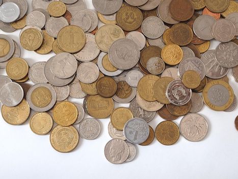 A collection of coins from different countries. Close-up