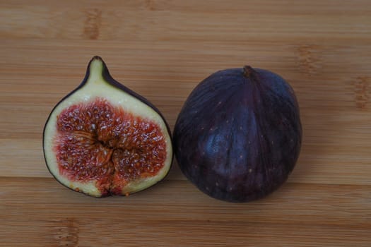 Exotic fruit on a wooden background, close-up. 