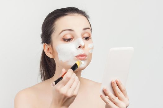 pretty woman naked shoulders skin care cream cosmetics. High quality photo