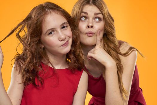 Family fun friendship emotions lifestyle yellow background. High quality photo