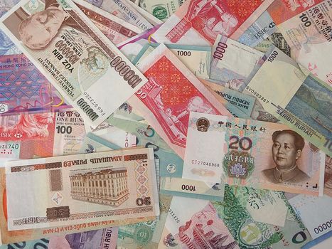 Paper money from different countries. Business and finance. Close-up.