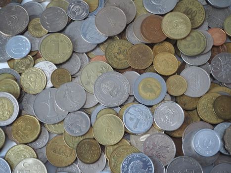 A collection of coins from different countries. Close-up