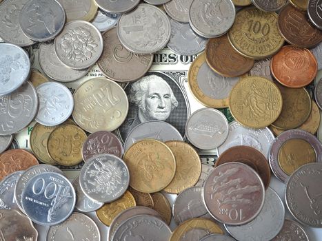 A collection of coins from different countries. Close-up