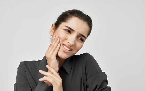 woman with displeased facial expression dental pain health problems dentistry. High quality photo