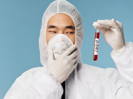 male laboratory assistant blood for covid-19 tests research pandemic. High quality photo